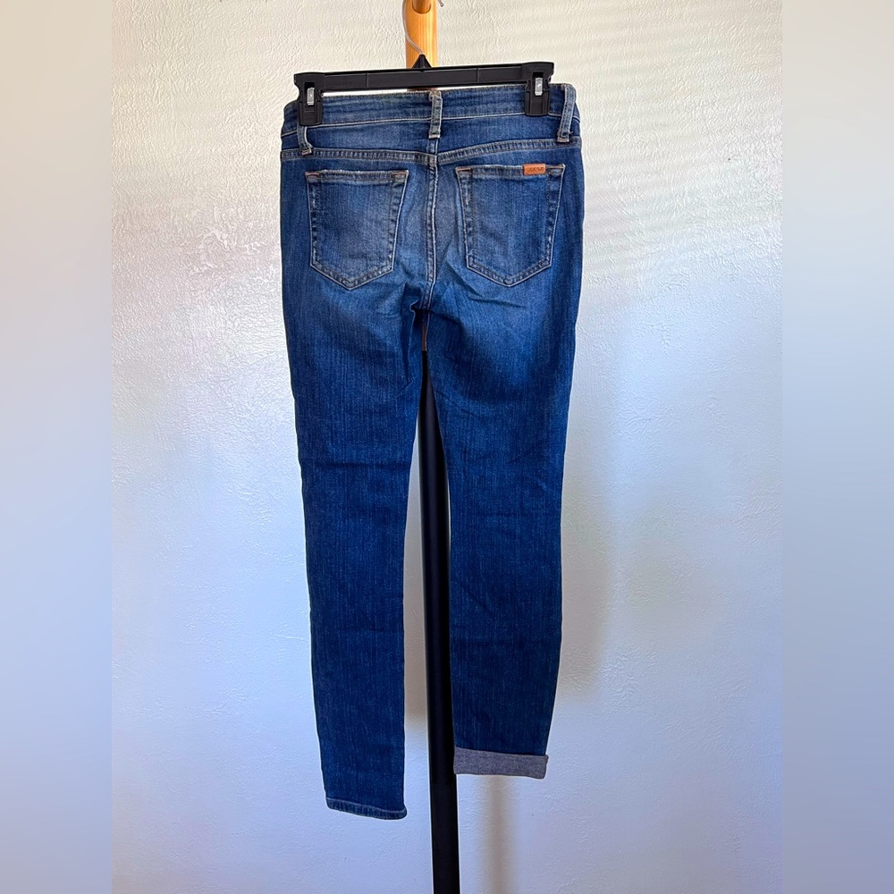 Joe’s jeans. Worn but in good condition.